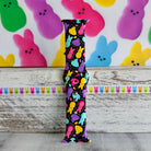 Neon Bunny Bash Apple Watch band with colorful peeps bunnies in pink, purple, yellow, and turquoise on black background
