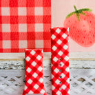 Both sizes of the Red Barn Babe Samsung Galaxy Watch band side by side, close view of the diagonal red and white gingham check.