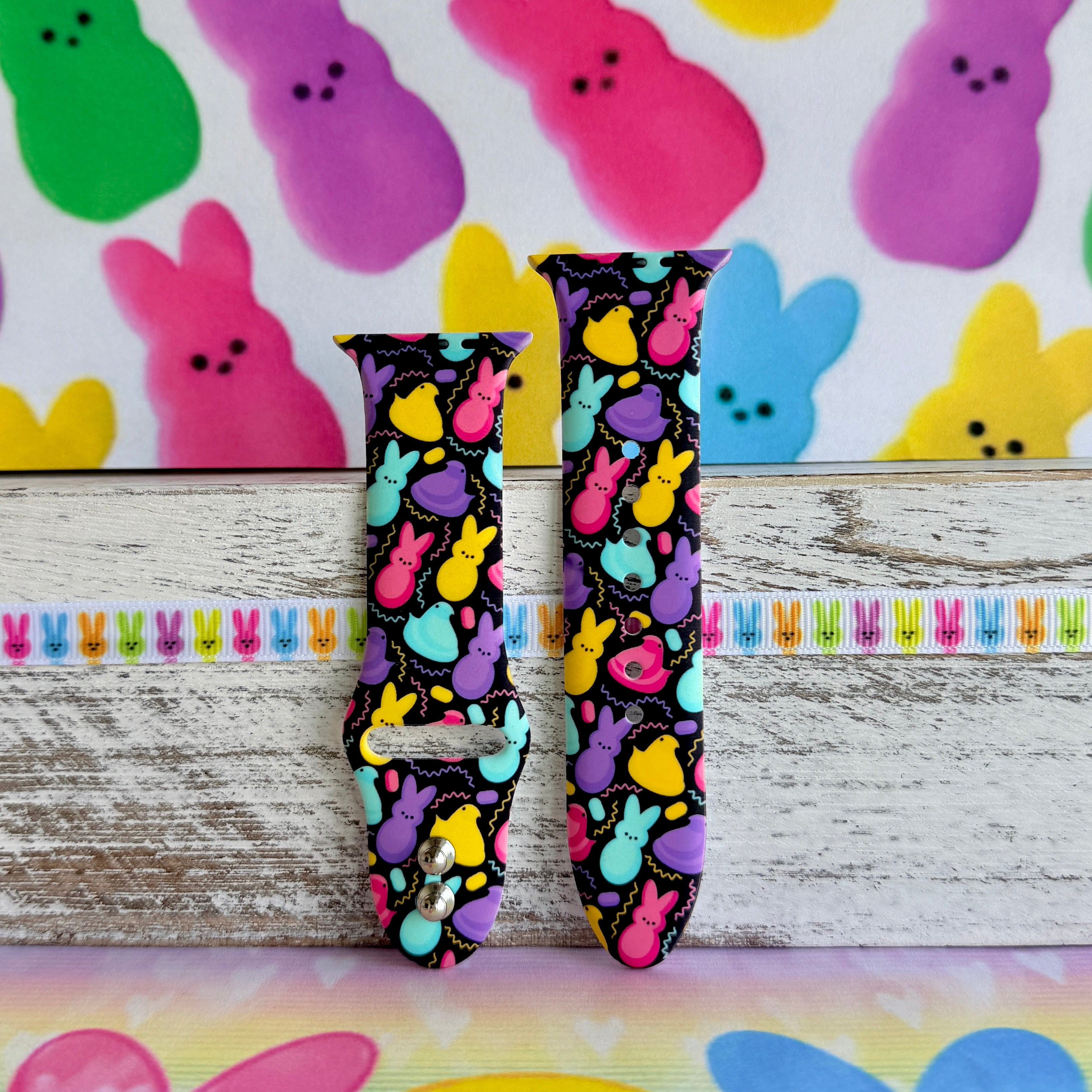 Neon Bunny Bash Apple Watch band with colorful peeps bunnies in pink, purple, yellow, and turquoise on black background
