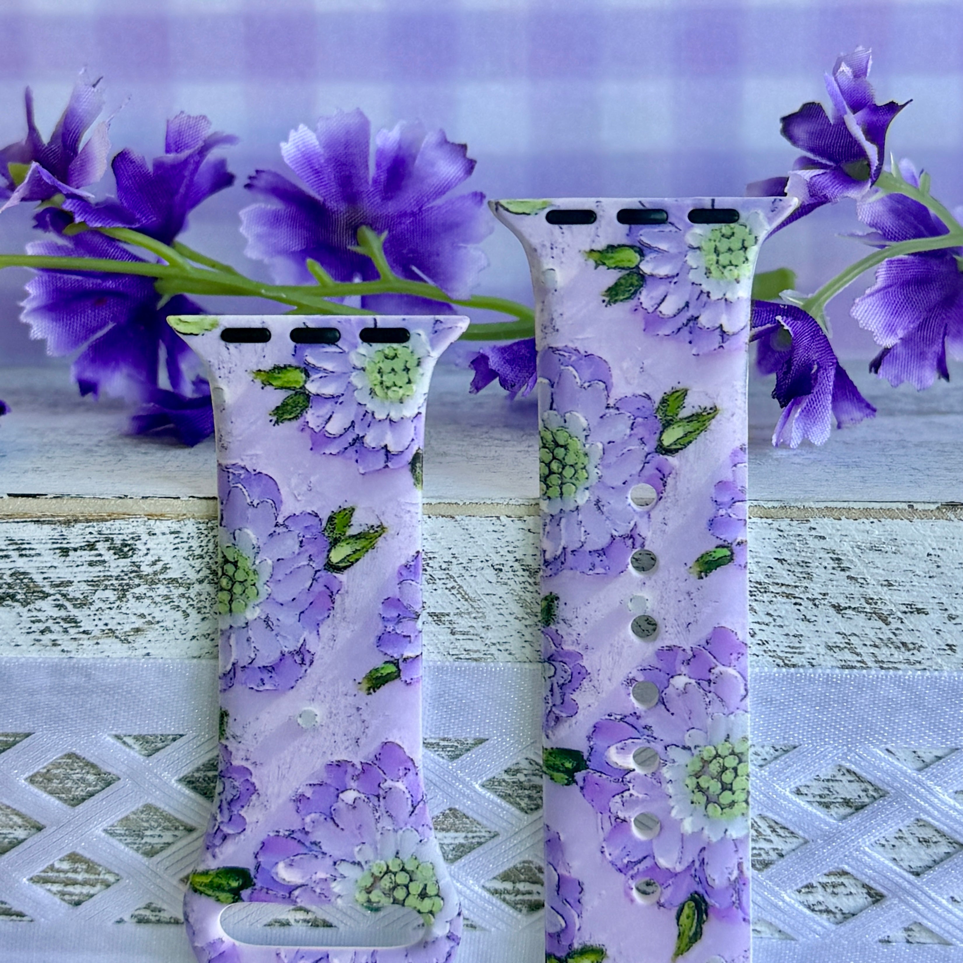 Purple Wildflower Apple Watch band with delicate lavender and purple blooms on lilac background with fresh flowers
