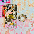 Yee Haw Honey retro Western MagSafe phone grip ring with a cowgirl on a horse, pink cowboy hat, desert cacti, glittery stars, and animal print on a brown and pink background compatible with iPhone and Samsung