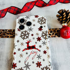 White Christmas iPhone case — plaid reindeer, joy script, glossy wavy edges