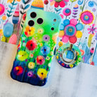 Petal Princess Hold It Fancy MagSafe grip ring attached to the matching Petal Princess iPhone case