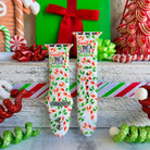 Two Twistmas Vibes Apple Watch bands in different sizes with holiday decorations
