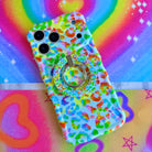 Rainbow Roar Leopard MagSafe phone grip ring with neon multi-colored animal print spots on a mint background compatible with iPhone and Samsung