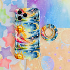 Cosmic Daydream celestial MagSafe phone grip ring with watercolor illustration of a personified sun, crescent moon, and stars in a dreamlike landscape compatible with iPhone and Samsung