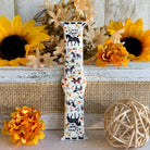 Decorative strip with horse-themed design on a rustic background with sunflowers and decorative elements.