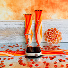 Orange Crush Apple Watch band with vibrant gradient stripes in orange and coral tones with decorative mandala
