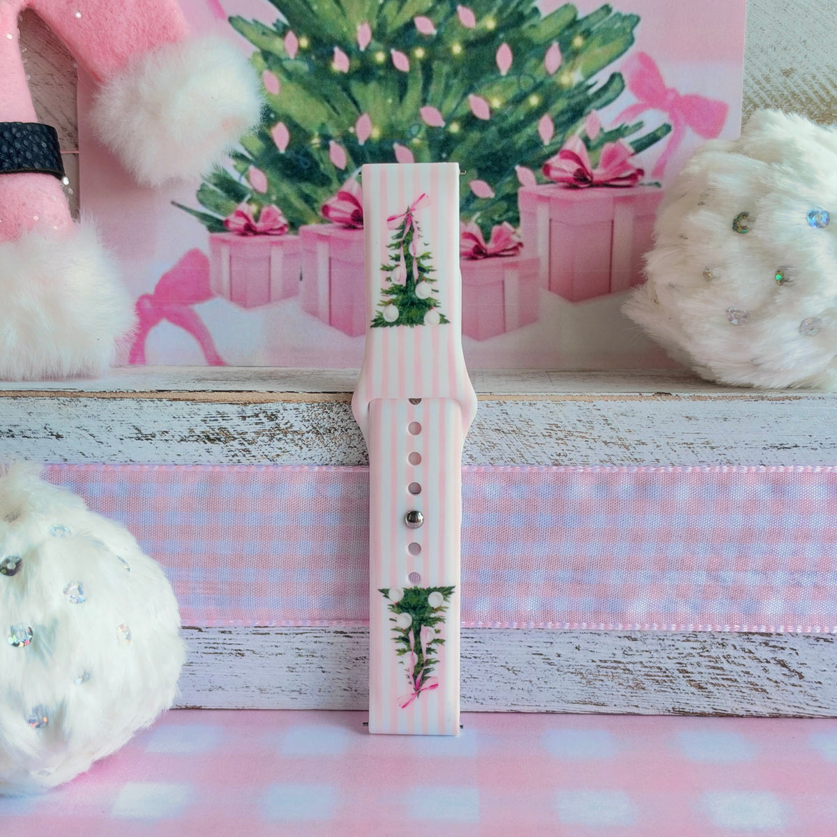 Pretty in PinkMas Samsung Galaxy Watch band assembled and standing upright, pink and white stripes with two bow-tied trees