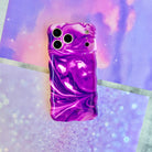 Grape Crush Wavy Luxe MagSafe iPhone case with a glossy purple liquid marble swirl design from Fancy Bands