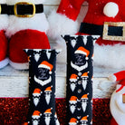 Close-up of Don't Stop Believin' Santa beard print on Apple Watch silicone band with red and white design
