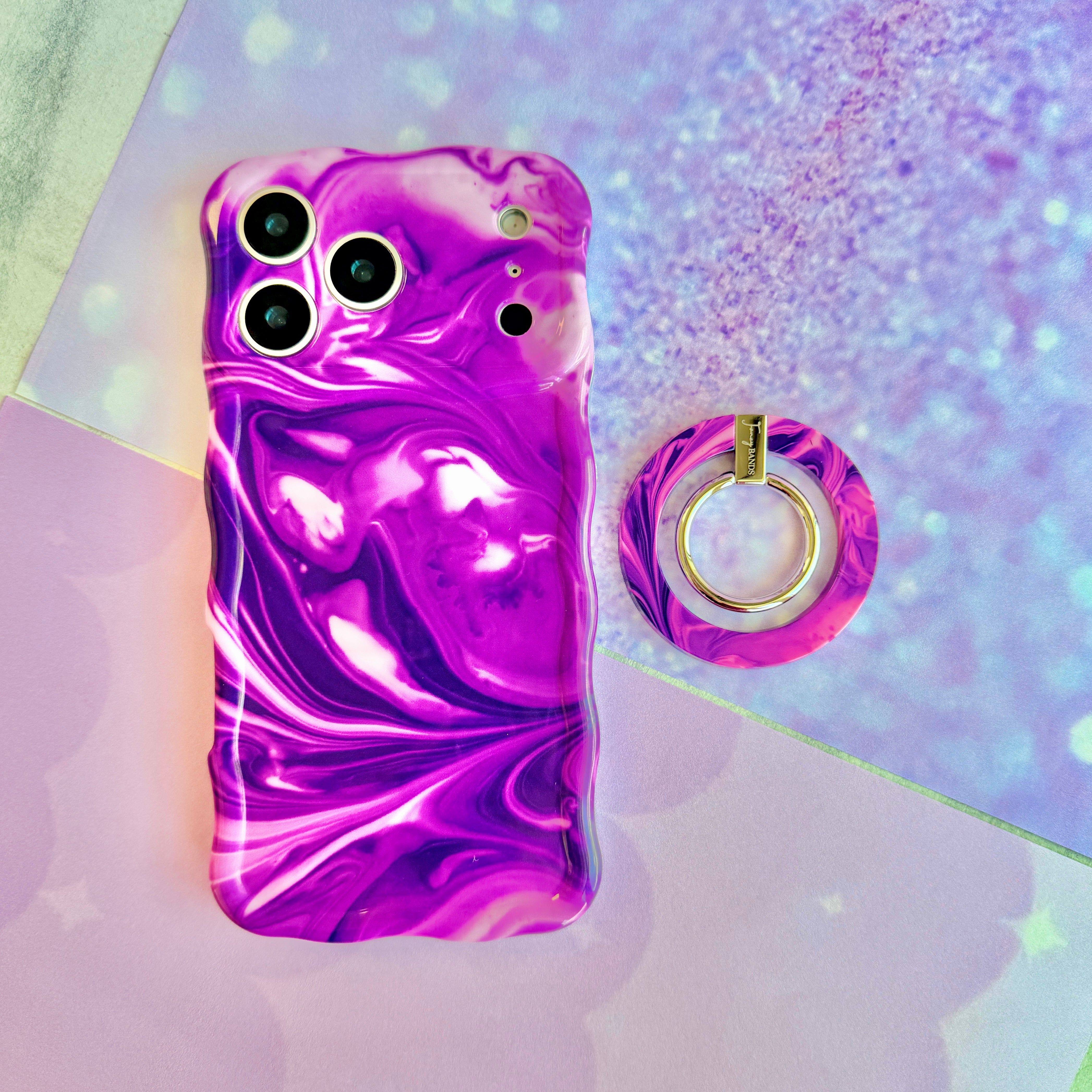 Grape Crush Hold It Fancy MagSafe grip ring with a glossy purple liquid marble swirl design from Fancy Bands