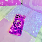 Grape Crush Wavy Luxe MagSafe iPhone case with a glossy purple liquid marble swirl design from Fancy Bands
