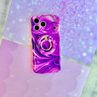 Grape Crush Hold It Fancy MagSafe grip ring with a glossy purple liquid marble swirl design from Fancy Bands