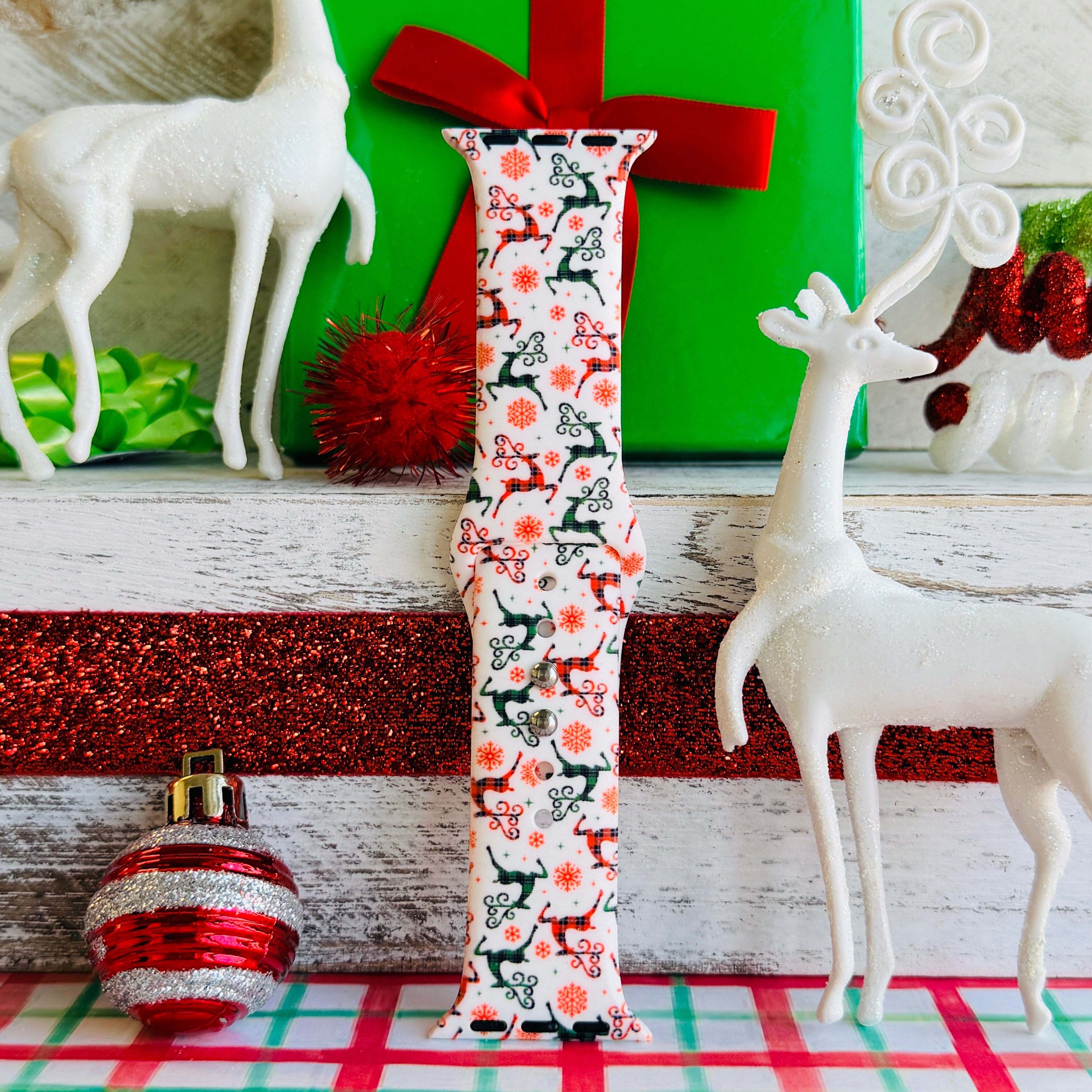 Reindeer Waltz festive Apple Watch strap with dancing reindeer and snowflake pattern
