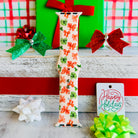 Jingle Bows gift-themed Apple Watch strap with festive bow pattern and holiday colors
