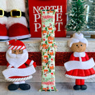 North Pole vintage Christmas Apple Watch strap with Santa's workshop scene and holiday characters
