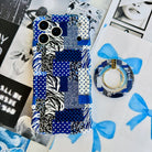 Sending Mixed Signals Hold It Fancy MagSafe grip ring with a blue and white mixed-pattern patchwork design from Fancy Bands