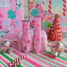 Peppermint Cutie Apple Watch band straps with glitter ornaments and a peppermint tree on candy stripe paper