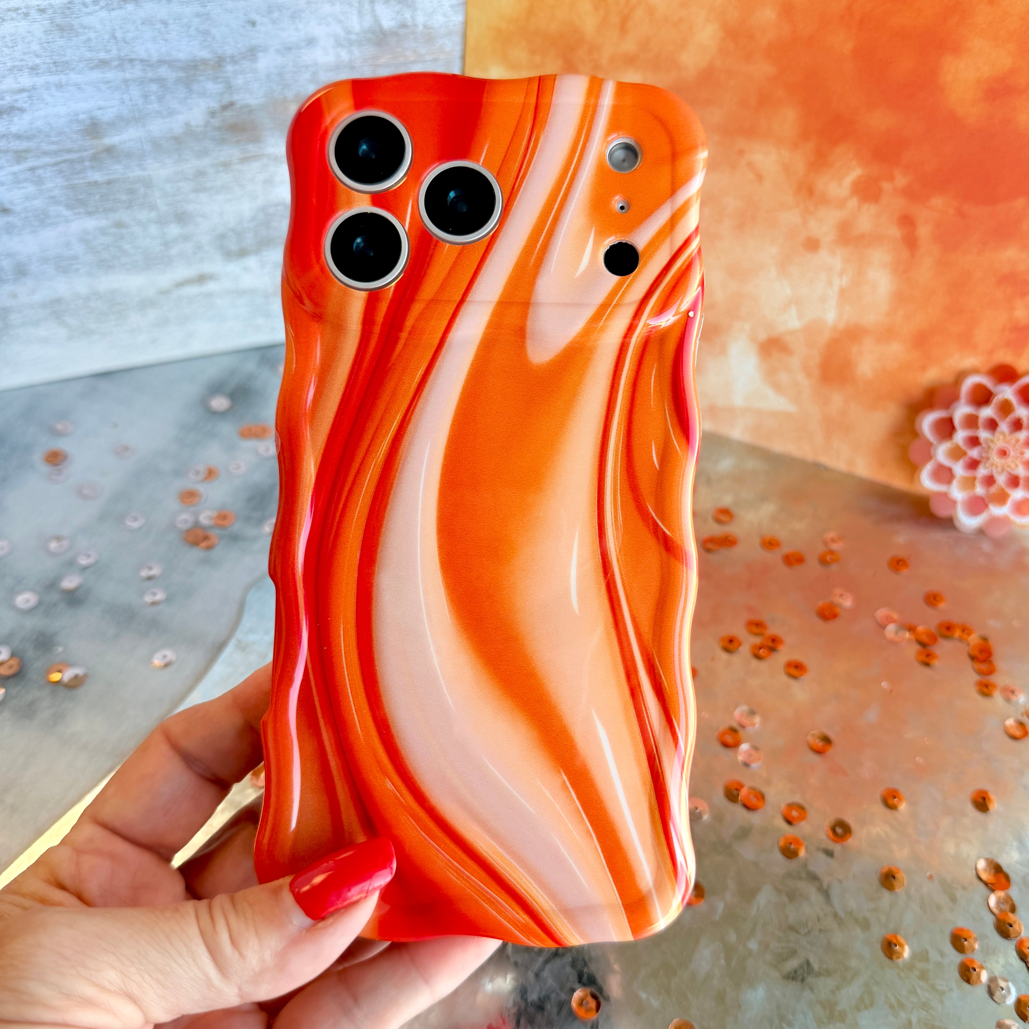 Orange Crush MagSafe iPhone case with swirled marble pattern in sunset orange by Fancy Bands
