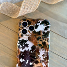 Rodeo Wild MagSafe iPhone case with cowhide and leopard print mix by Fancy Bands
