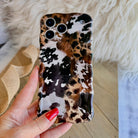 Rodeo Wild MagSafe iPhone case with cowhide and leopard print mix by Fancy Bands
