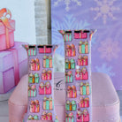 Close-up of both No Peeking, Darling Apple Watch band straps, pastel pink, aqua and striped gift boxes with gold bows