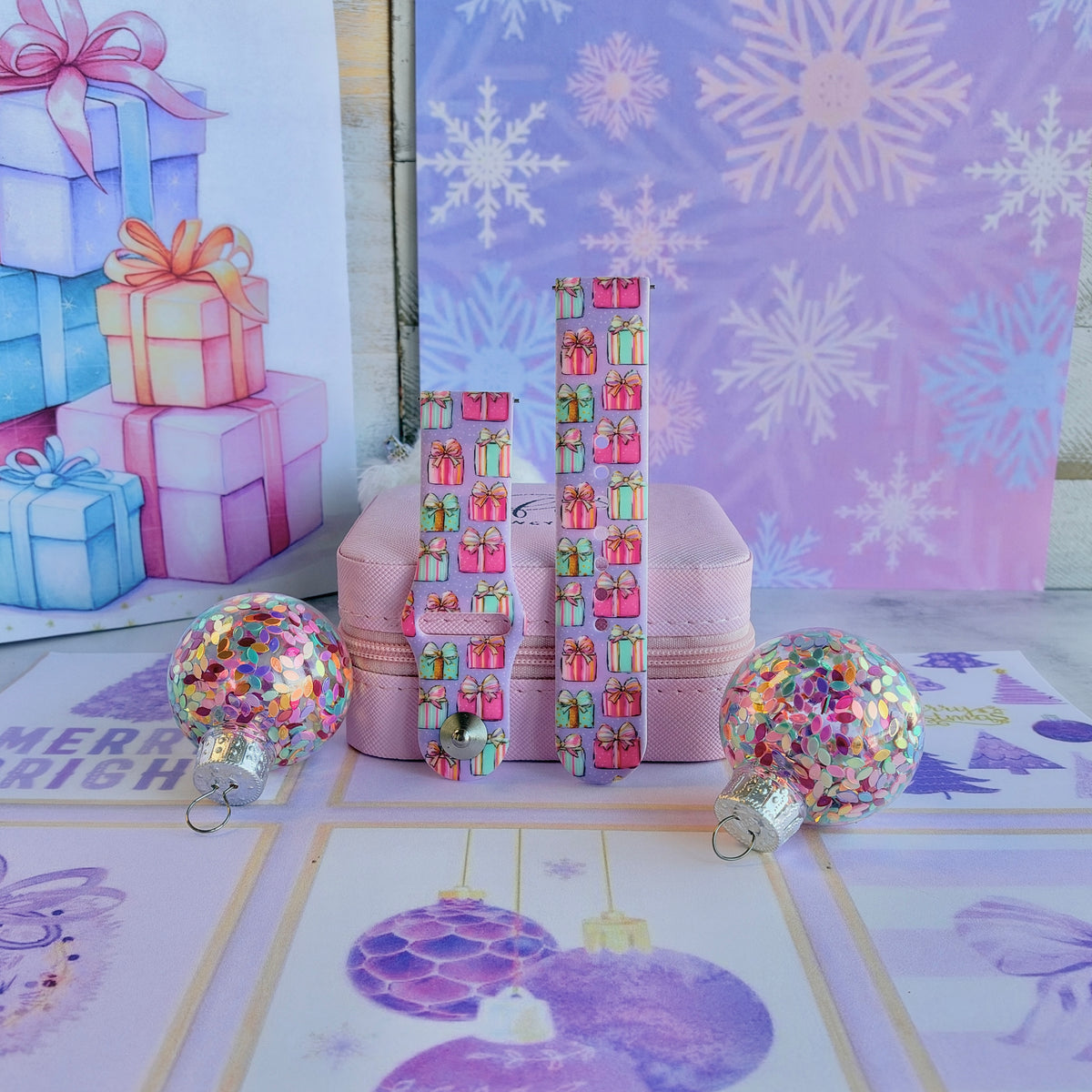 Both straps of the No Peeking, Darling silicone Samsung Galaxy Watch band on a pink jewelry box with confetti ornaments