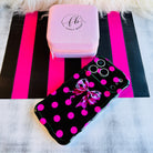 Sweet Spot MagSafe iPhone case with hot pink polka dots and cowhide bow on black by Fancy Bands
