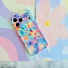 Trendy wavy iPhone case featuring an iridescent swirly pattern in pastel pink, blue, yellow, and lavender with a high-gloss finish.