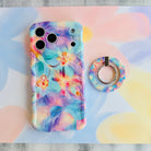 Pastel Paradise iridescent floral MagSafe phone grip ring with glowing lavender blue and coral petals compatible with iPhone and Samsung