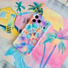 Trendy wavy iPhone case featuring an iridescent swirly pattern in pastel pink, blue, yellow, and lavender with a high-gloss finish.
