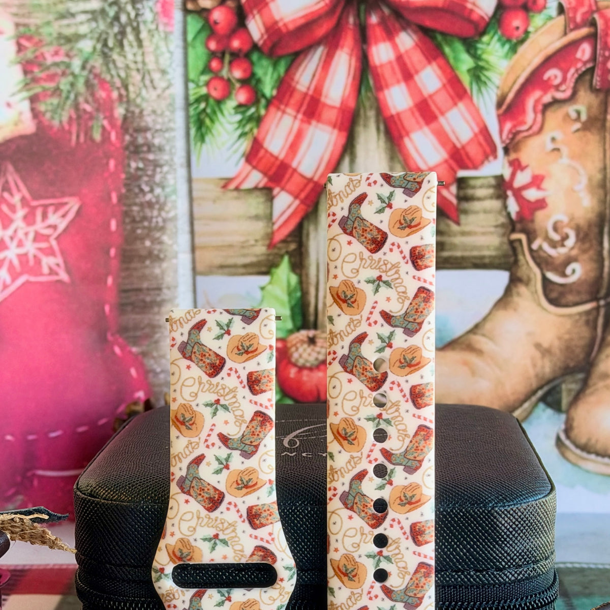 Close-up of both Boot Scootin' Christmas Samsung Galaxy Watch band straps with cowboy boots, hats and candy canes on cream