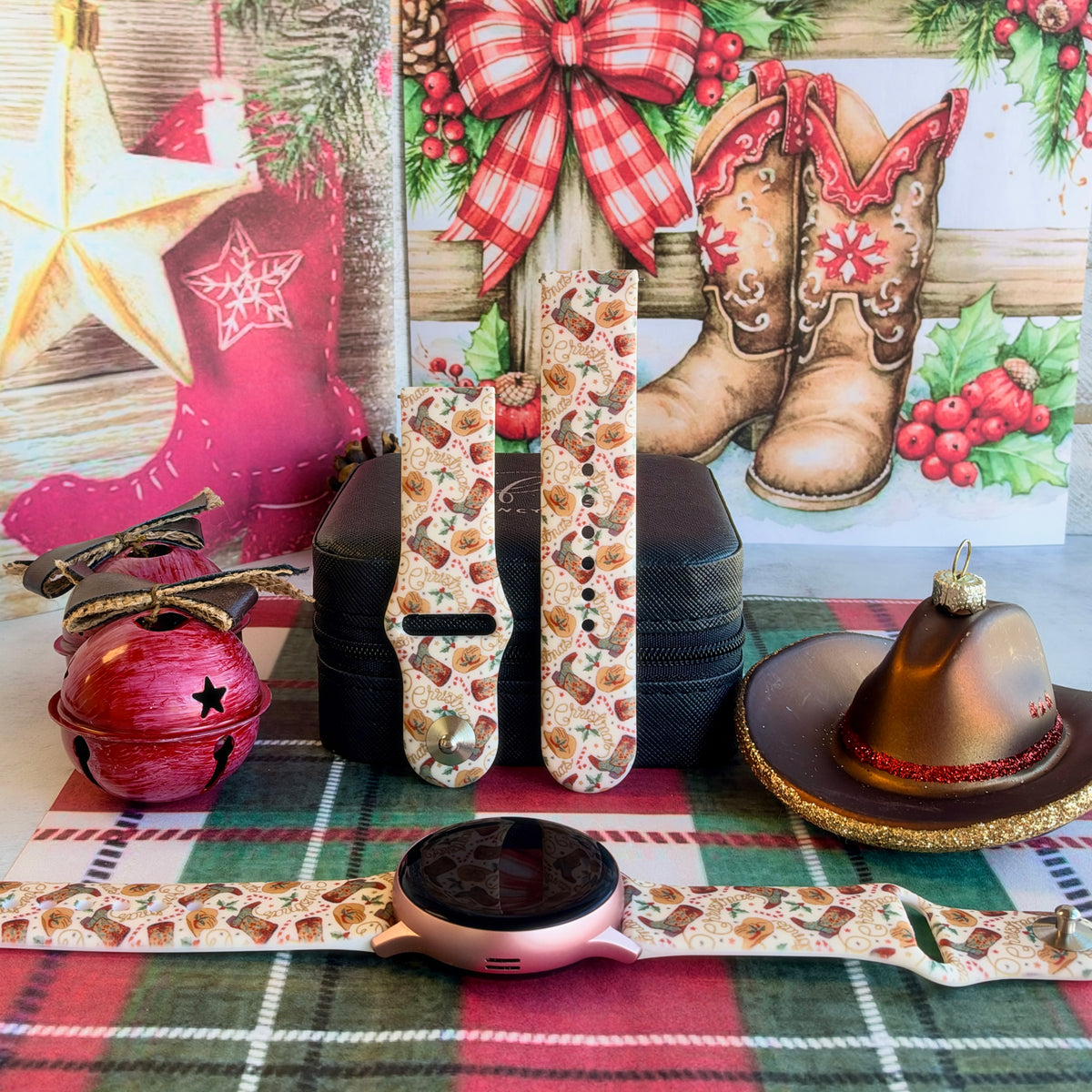 Boot Scootin' Christmas Samsung Galaxy Watch band on a rose gold Galaxy Watch, with both straps on a black jewelry box