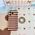 Sweet Espresso Stripes Hold It Fancy MagSafe grip ring with a brown and cream striped print from Fancy Bands