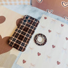 Toffee Tartan Hold It Fancy MagSafe grip ring with a brown, tan and cream tartan plaid print from Fancy Bands