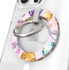Colorful disco ball pattern MagSafe phone grip ring and stand on pink background compatible with iPhone and Samsung
