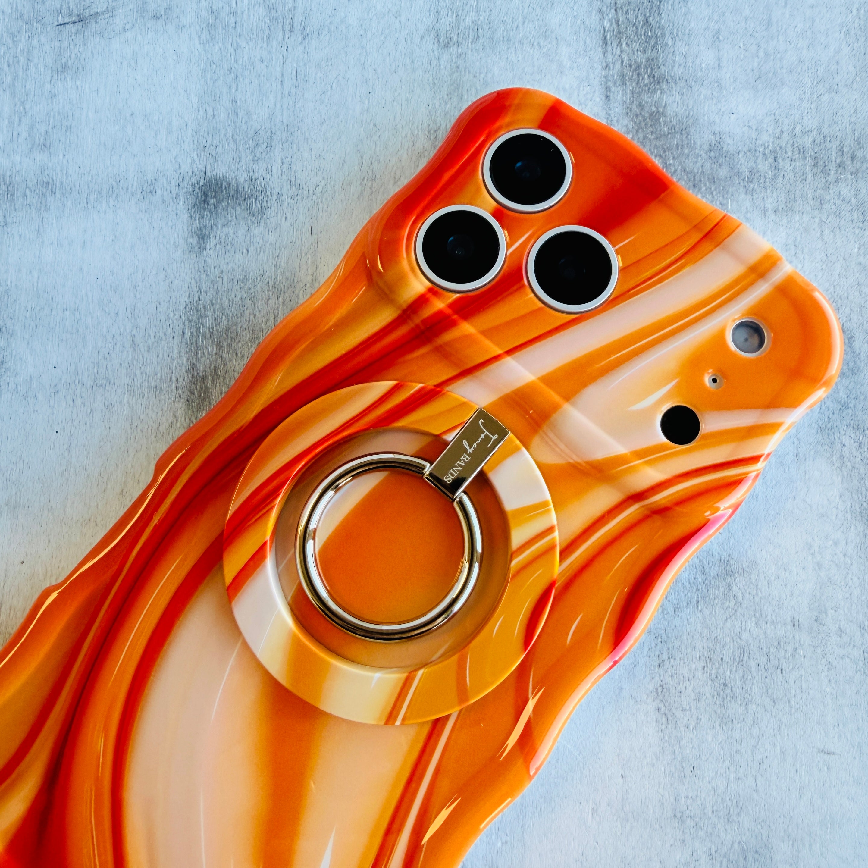 Orange Crush bright abstract orange swirl pattern MagSafe phone grip ring and stand compatible with iPhone and Samsung