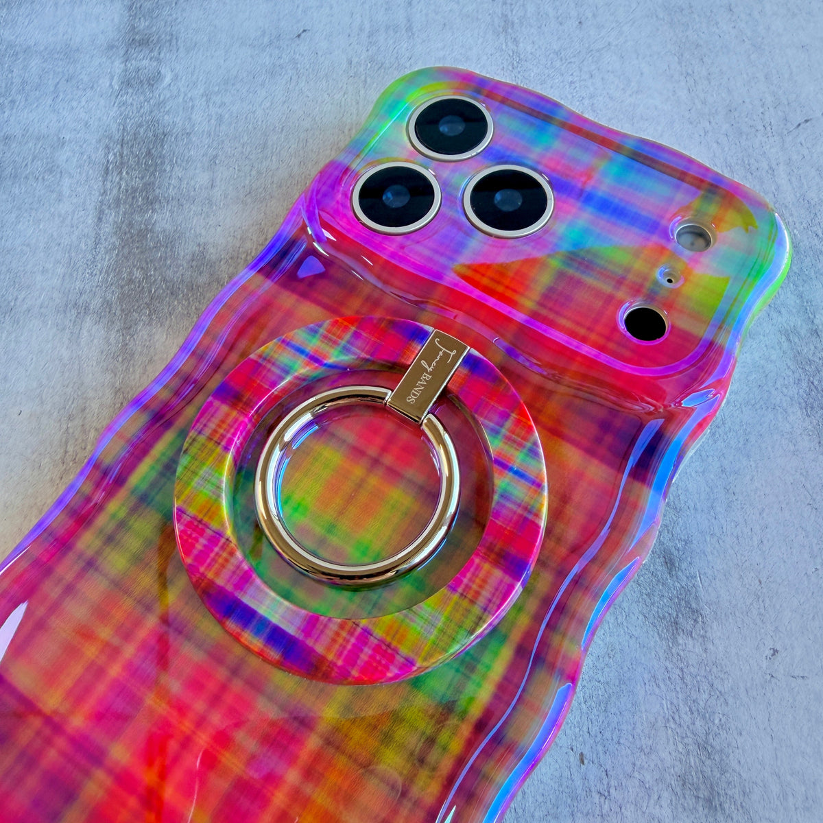 Hazy Tartan Hold It Fancy MagSafe grip ring attached to the matching blurred plaid iPhone case