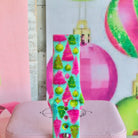 Close-up of a single Merry & Bright, Totally! Samsung Galaxy Watch band strap, pink and green Christmas tree print