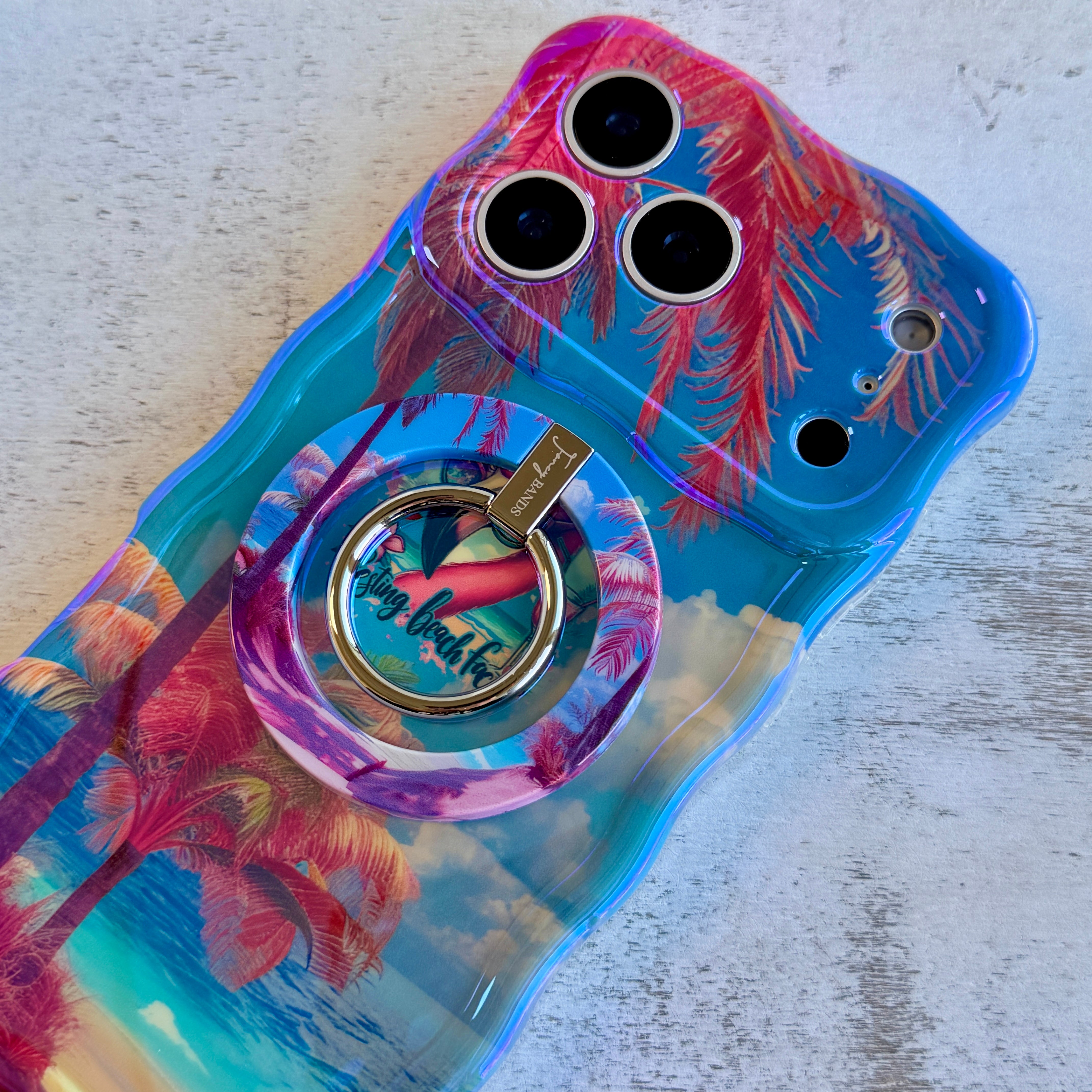 Resting Beach Face tropical beach scene MagSafe phone grip ring with pink sand and palm trees compatible with iPhone and Samsung