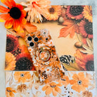Fall Blooms Hold It Fancy MagSafe grip ring with a warm autumn floral print in orange and cream from Fancy Bands