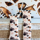 Game Day Darling coquette football print silicone band for Apple Watch with footballs, pumpkins, bows and hearts from Fancy Bands