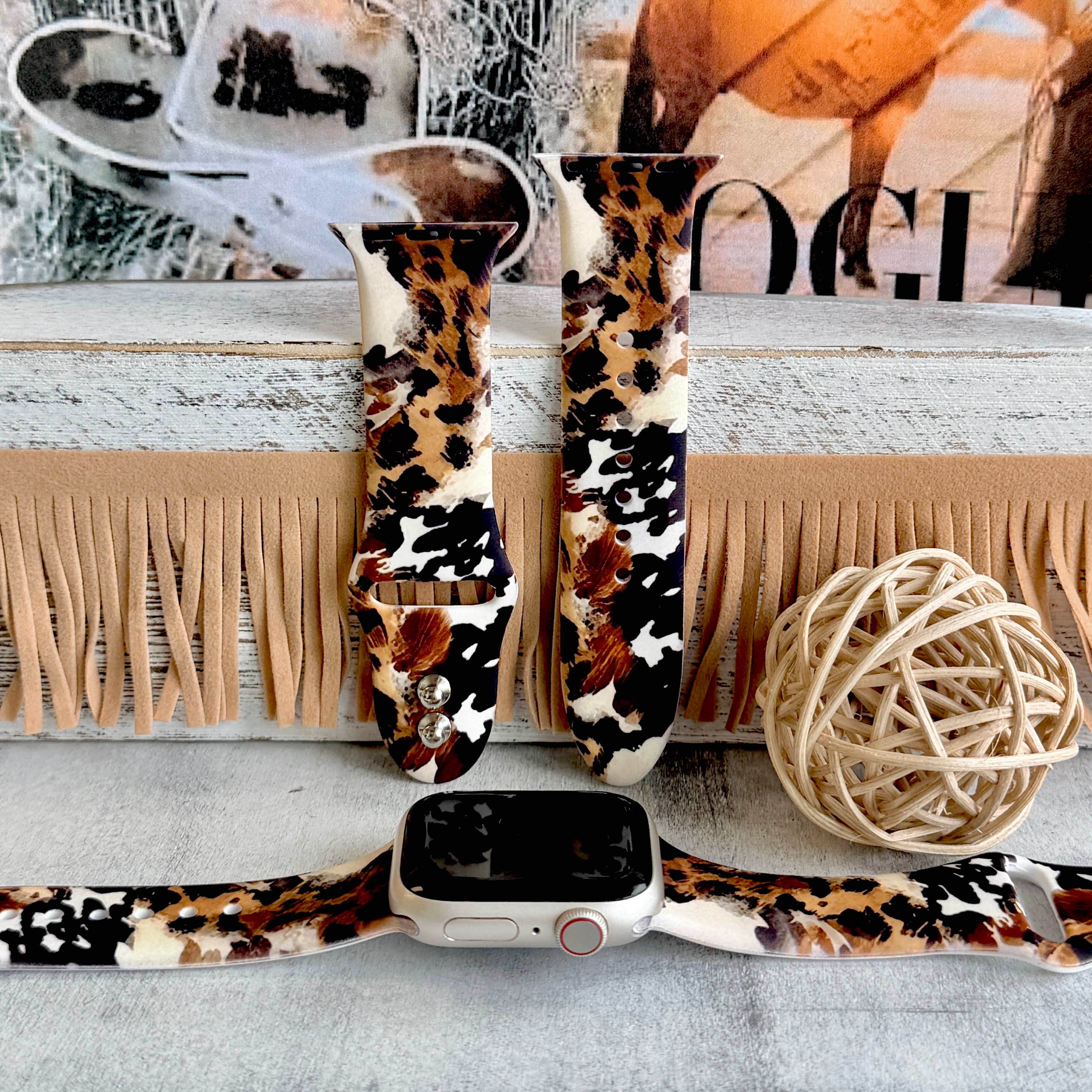 Rodeo Wild Apple Watch band with cowhide and leopard print patterns in brown, black, and cream with Western decor
