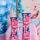 Close-up of both Sugarplum Square Apple Watch band straps with pink gingerbread houses, frosted rooftops and blue pines