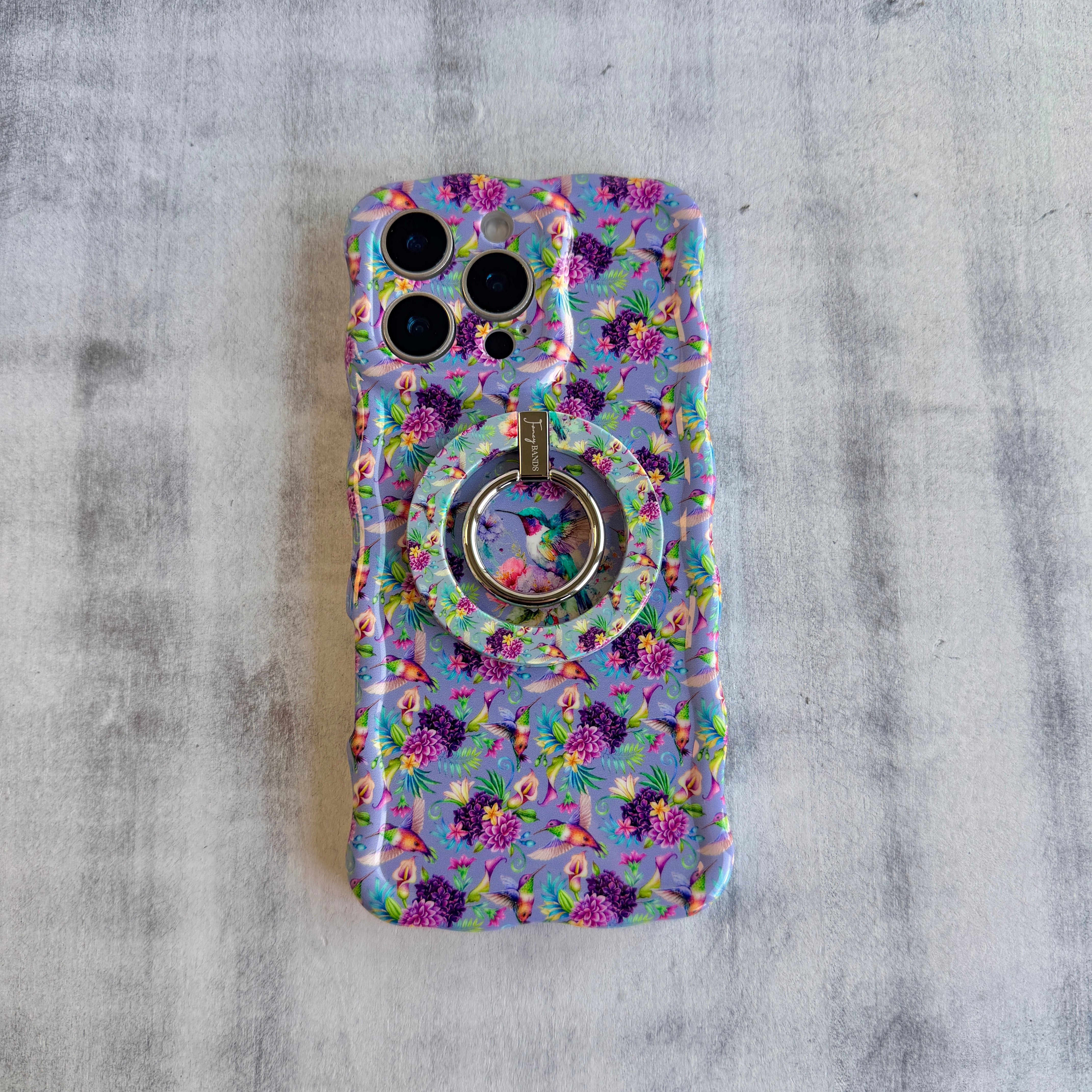 Hummingbird Bliss pattern MagSafe phone grip ring with colorful birds and purple flowers on lavender background compatible with iPhone and Samsung