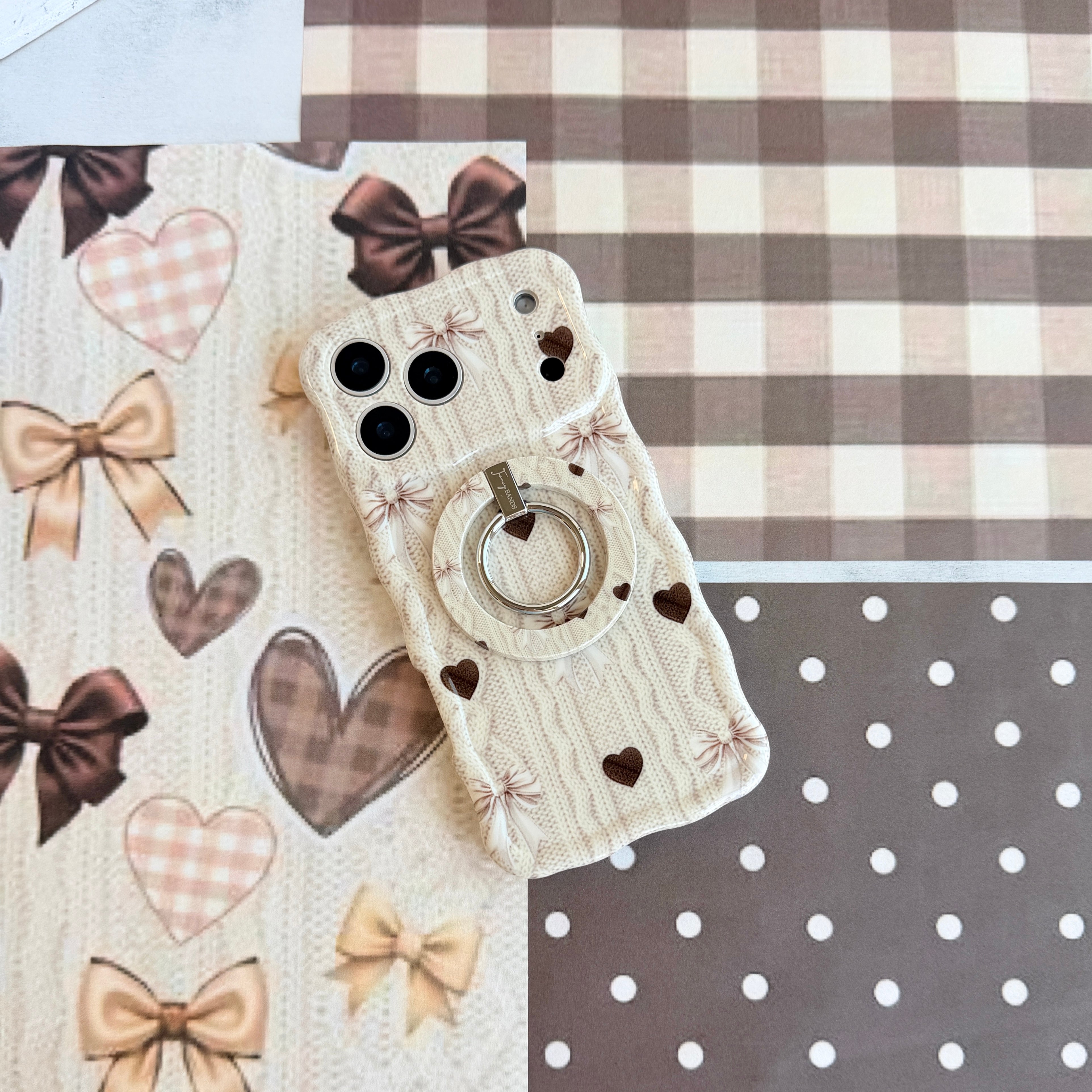 Sweater Weather Sweetheart Wavy Luxe iPhone case styled with fall knits and coquette accessories for autumn outfit inspiration from Fancy Bands.