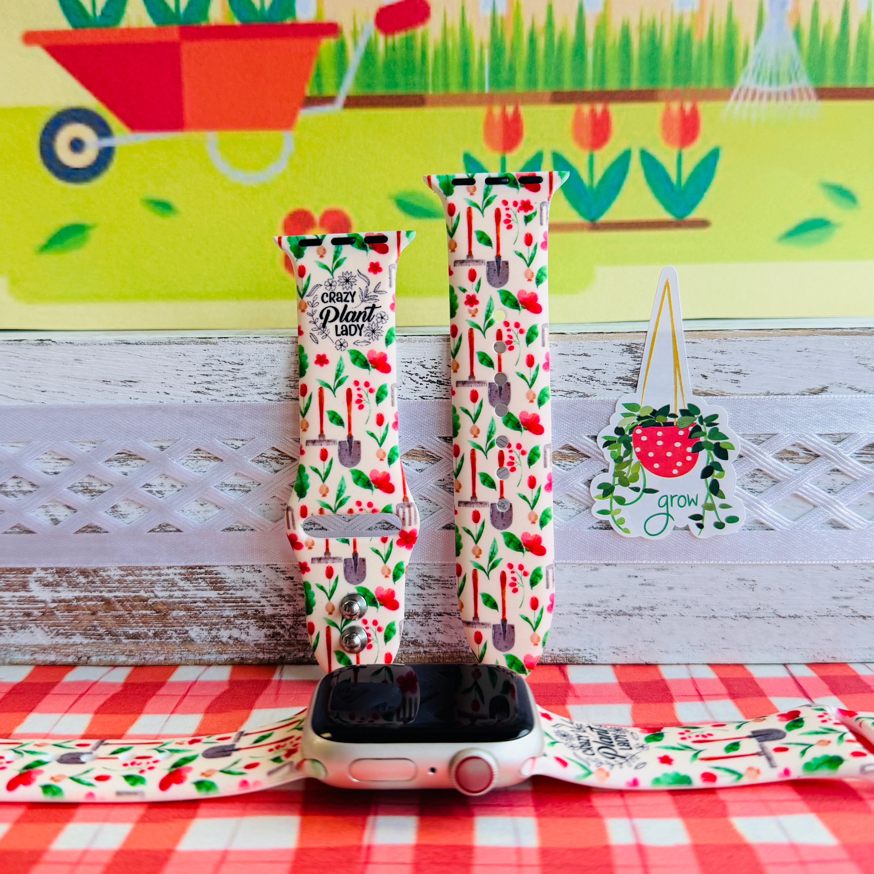 Crazy Plant Lady Apple Watch band with gardening tools, red flowers, and green leaves on cream background with garden decorations