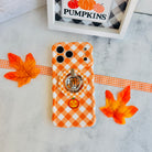 Happy Fall Y'all Hold It Fancy MagSafe grip ring with an orange gingham and pumpkin print from Fancy Bands