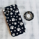Black Paw Print pattern MagSafe phone grip ring with white paws on black background compatible with iPhone and Samsung